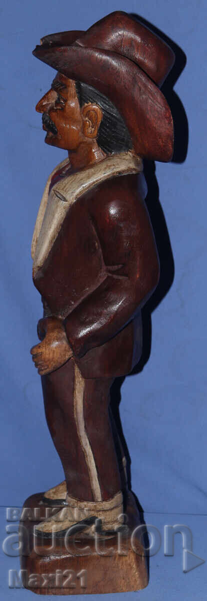 Delivery of Old wood carving sculpture cowboy