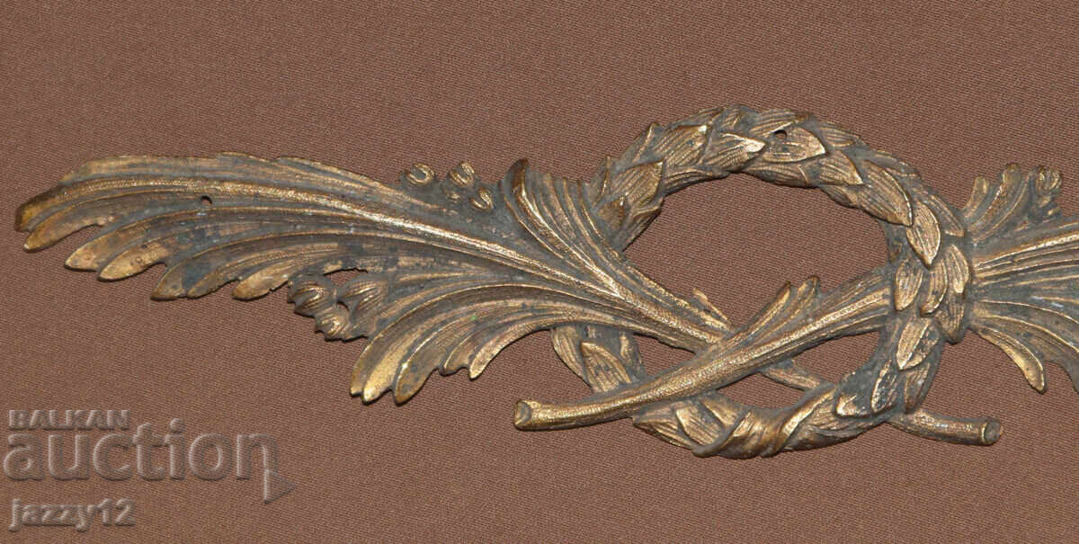 Δημοπρασία Αρχαία μπρούτζινη απλίκα με φλοράλ μοτίβα Δημοπρασία Αρχαία μπρούτζινη απλίκα με φλοράλ μοτίβα