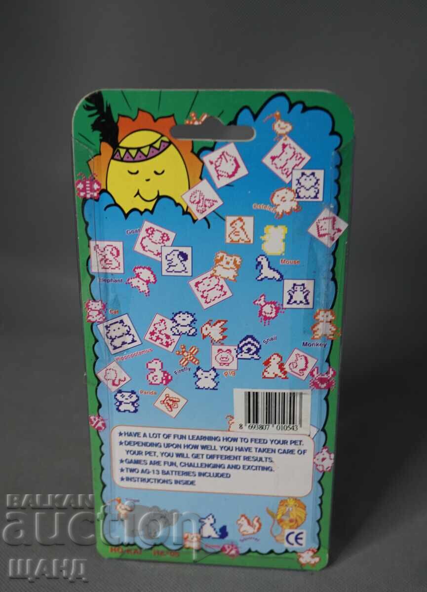 Auction  1997 Tamagotchi Digital Pet 50 in 1 Game Toy