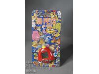 1997 Tamagotchi Digital Pet 50 in 1 Game Toy