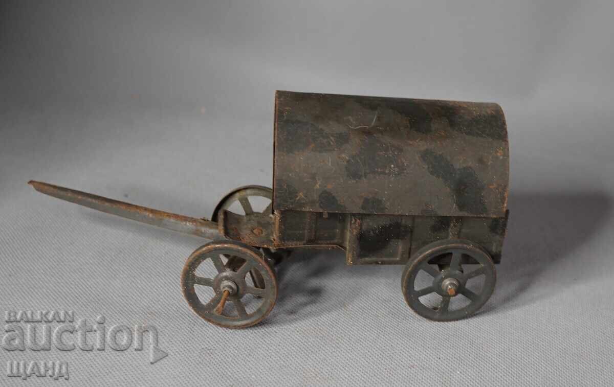 Auction  Old German metal sheet toy model cart