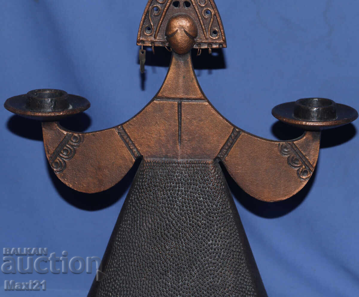 Delivery of Decorative Russian metal candlestick, woman in traditional costume