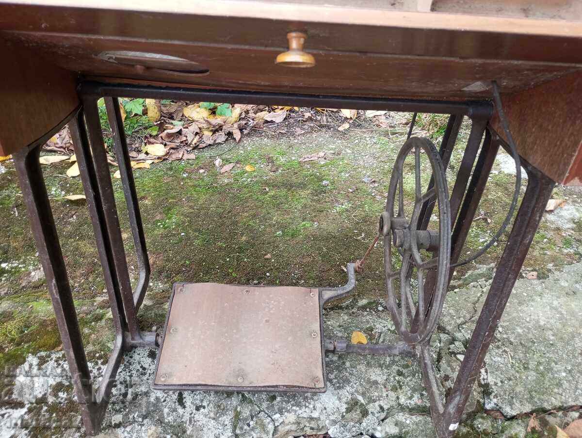 Old sewing machine with metal legs with price 75.00 BGN | € 38.35