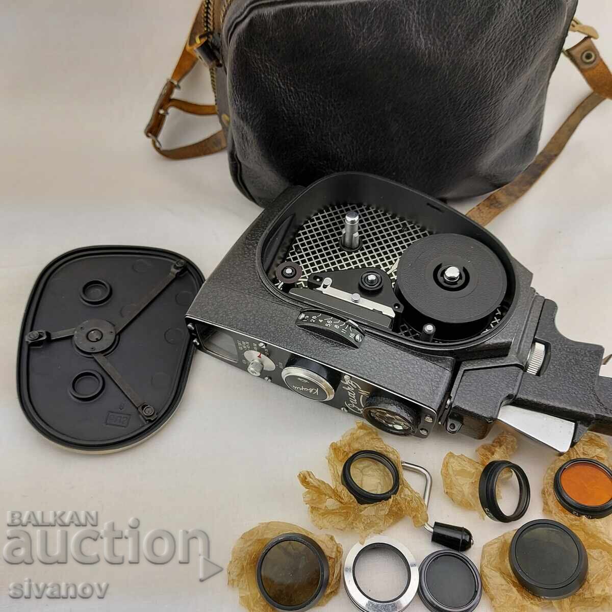 Livrarea Veche cameră video "Quarz M" 8mm cu filtre și geantă #2553