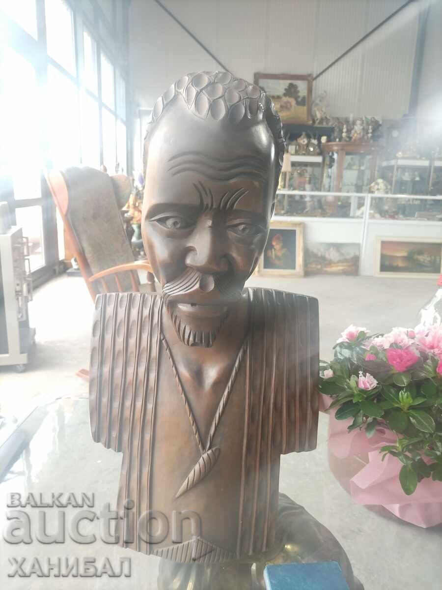 Bust of an African American made of ebony wood Bust of an African American made of ebony wood