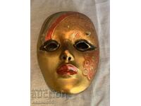 Brass wall mask