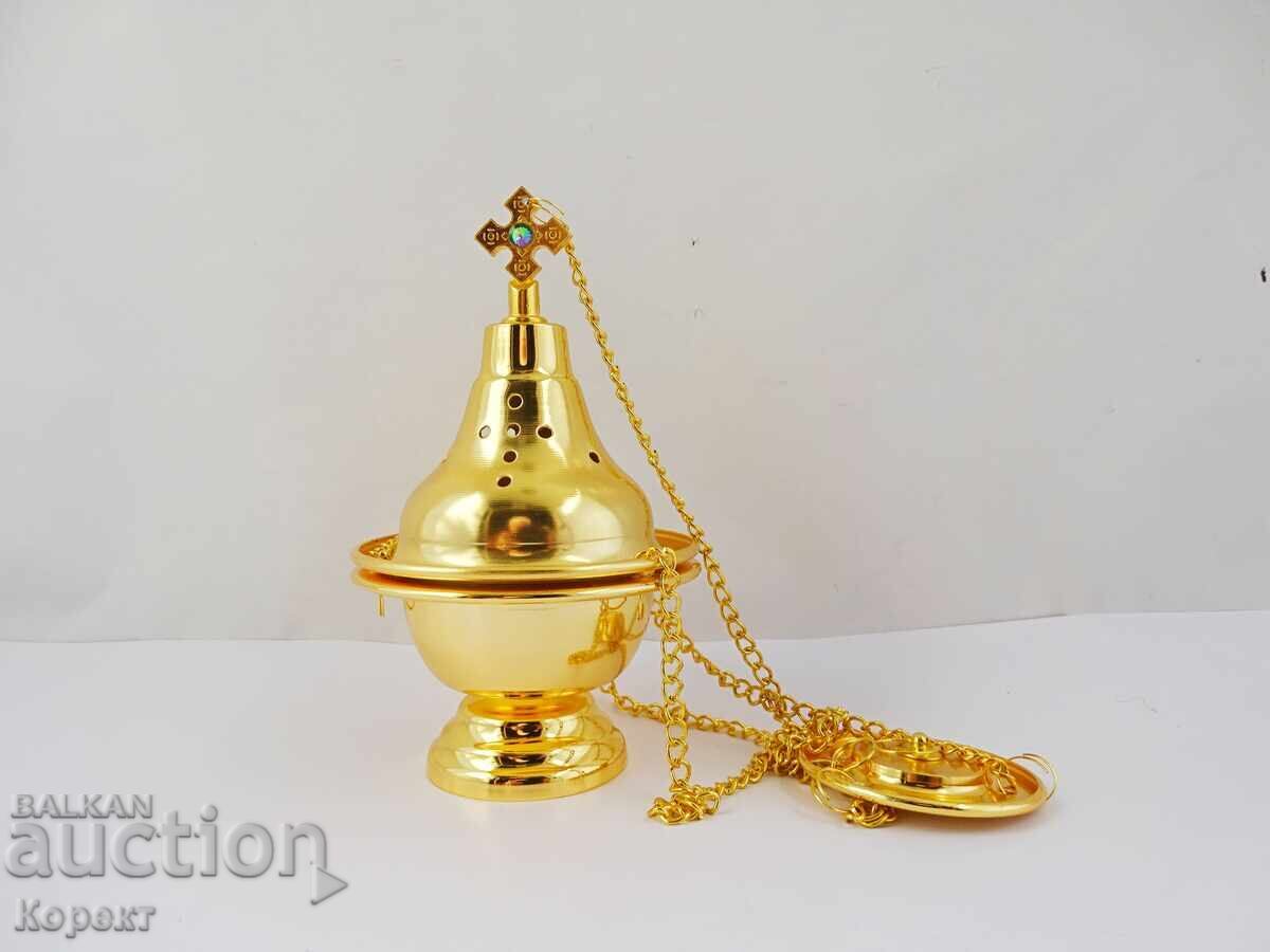 Nouă mică candelă de bronz