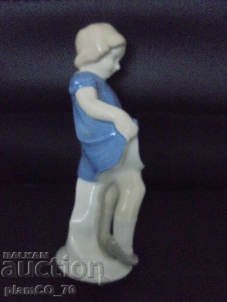 Auction №8319 Old porcelain figurine "Little girl with a dress" Auction №8319 Old porcelain figurine "Little girl with a dress"