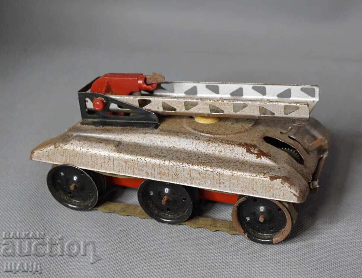 Old metal mechanical toy model tank missile carrier