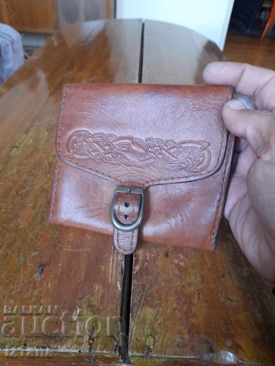 Delivery of Old leather belt bag