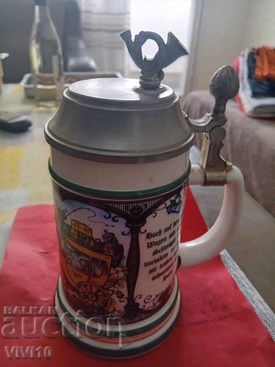 Licitație Cană veche germană cu lanternă