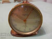 Ceas de masă Looping