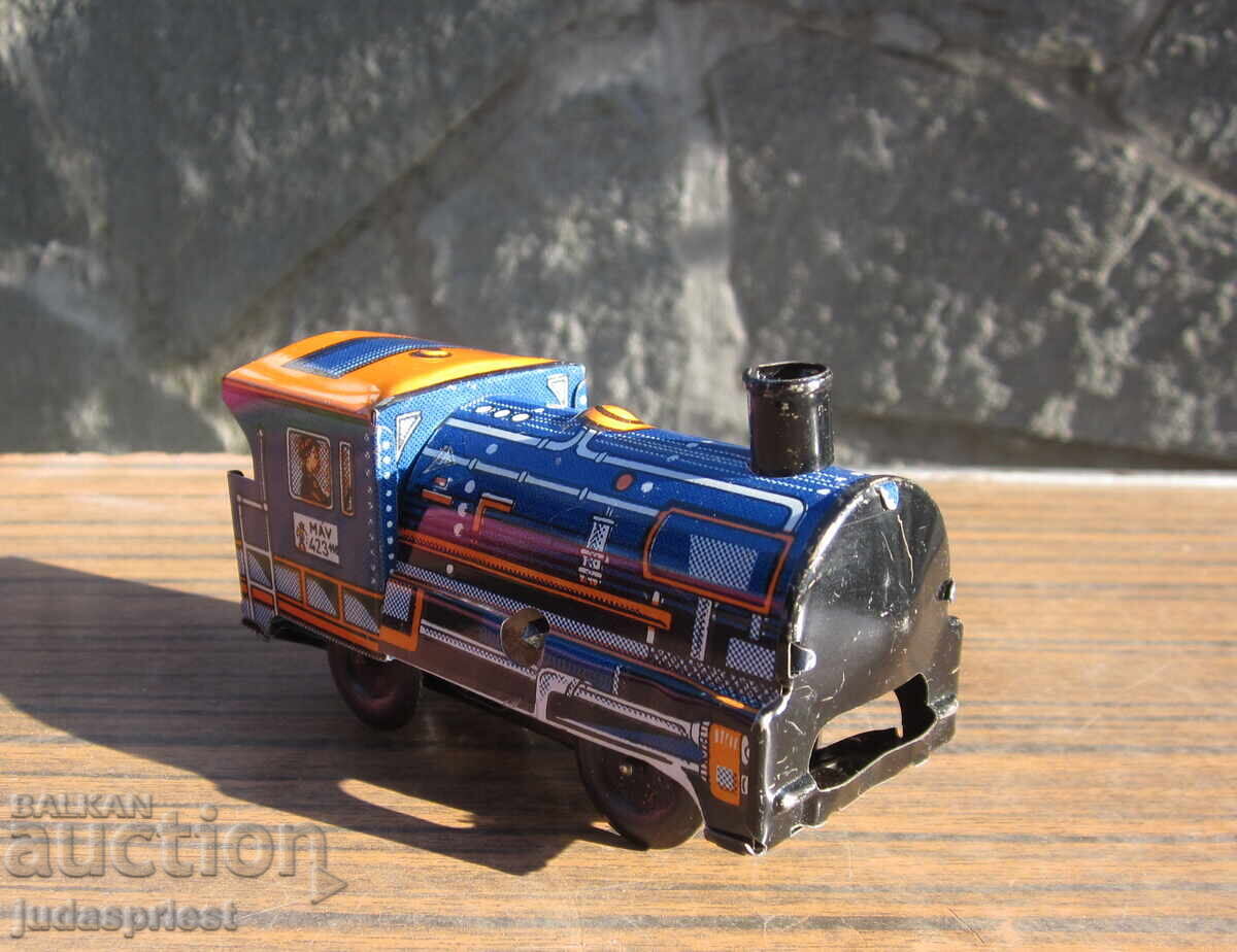 Παλιό μηχανικό μεταλλικό παιχνίδι από λαμαρίνα, ατμομηχανή από την εποχή του σοσιαλισμού με τιμή 20.00 BGN | € 10.23 Παλιό μηχανικό μεταλλικό παιχνίδι από λαμαρίνα, ατμομηχανή από την εποχή του σοσιαλισμού με τιμή 20.00 BGN | € 10.23