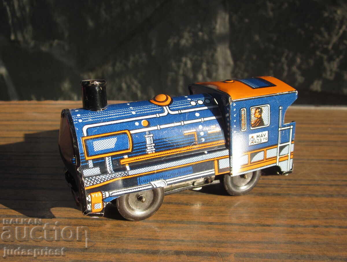 Δημοπρασία Παλιό μηχανικό μεταλλικό παιχνίδι από λαμαρίνα, ατμομηχανή από την εποχή του σοσιαλισμού Δημοπρασία Παλιό μηχανικό μεταλλικό παιχνίδι από λαμαρίνα, ατμομηχανή από την εποχή του σοσιαλισμού