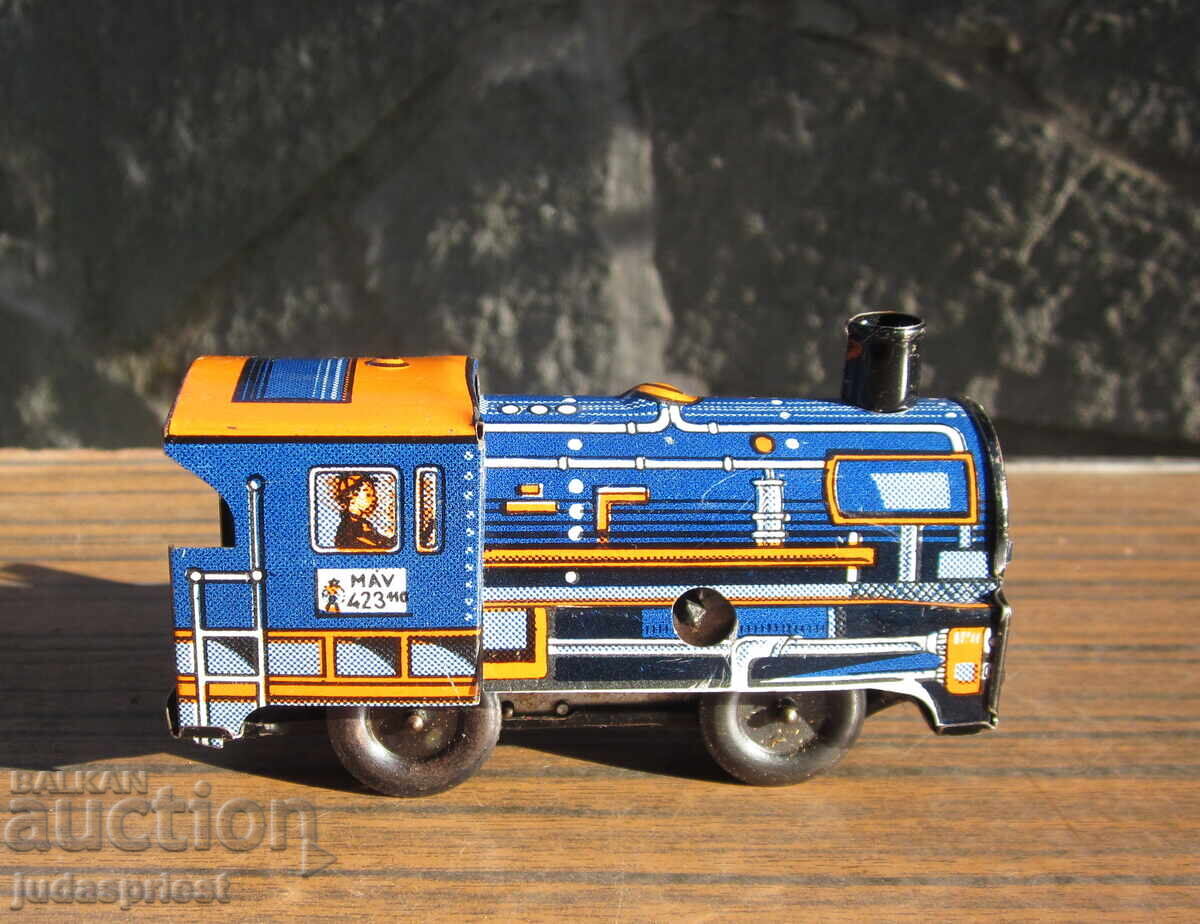 Παλιό μηχανικό μεταλλικό παιχνίδι από λαμαρίνα, ατμομηχανή από την εποχή του σοσιαλισμού Παλιό μηχανικό μεταλλικό παιχνίδι από λαμαρίνα, ατμομηχανή από την εποχή του σοσιαλισμού