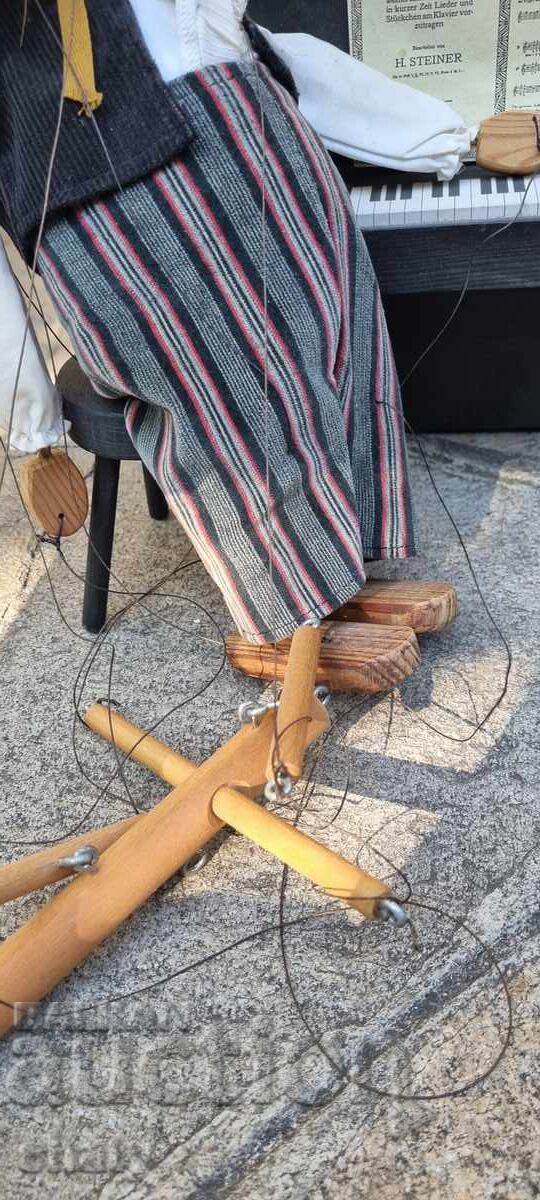 Delivery of Marionette. Wooden Doll