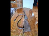 O jucărie veche pentru copii, o pușcă