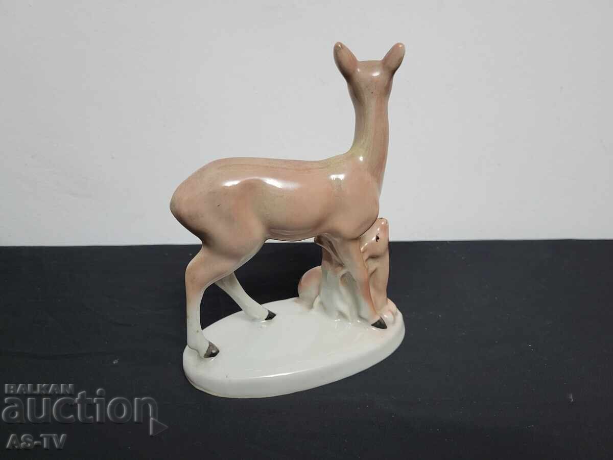 Auction  Porcelain figurine of deer