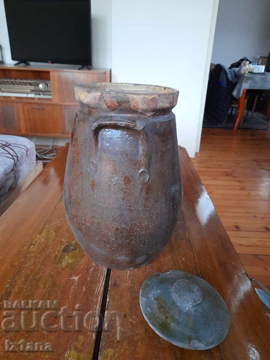 Delivery of Old ceramic pot, jug