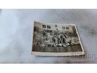 Photograph Eliseev Young men on the riverbank 1954