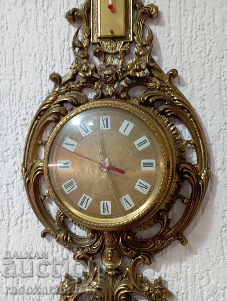 Delivery of Bronze weather station with clock, thermometer, barometer, and hygrometer Delivery of Bronze weather station with clock, thermometer, barometer, and hygrometer