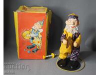 Old metal mechanical toy figure doll circus clown