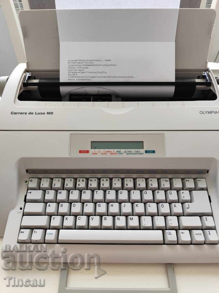 Auction  Olympia Carera Deluxe MD Typewriter