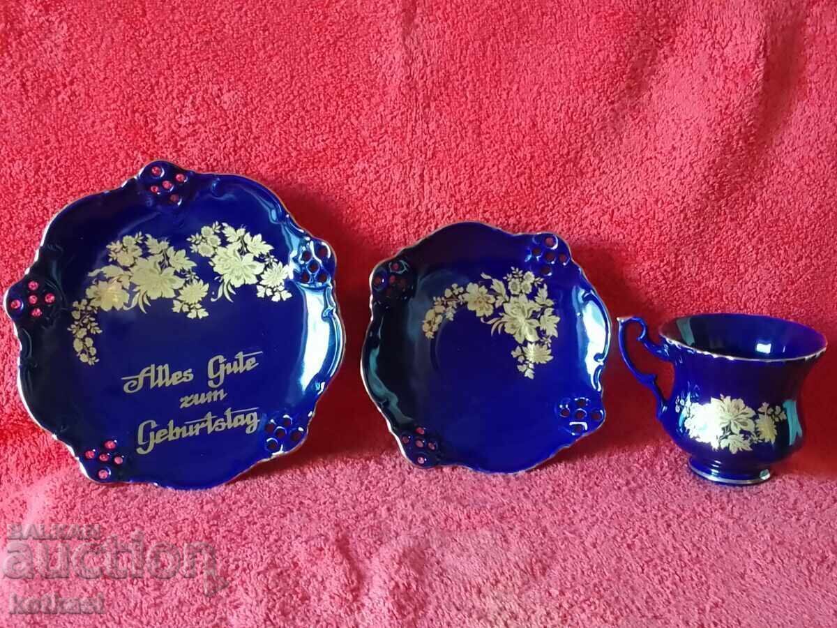 Auction  Three-piece set - cup, 2 plates, cobalt gilding