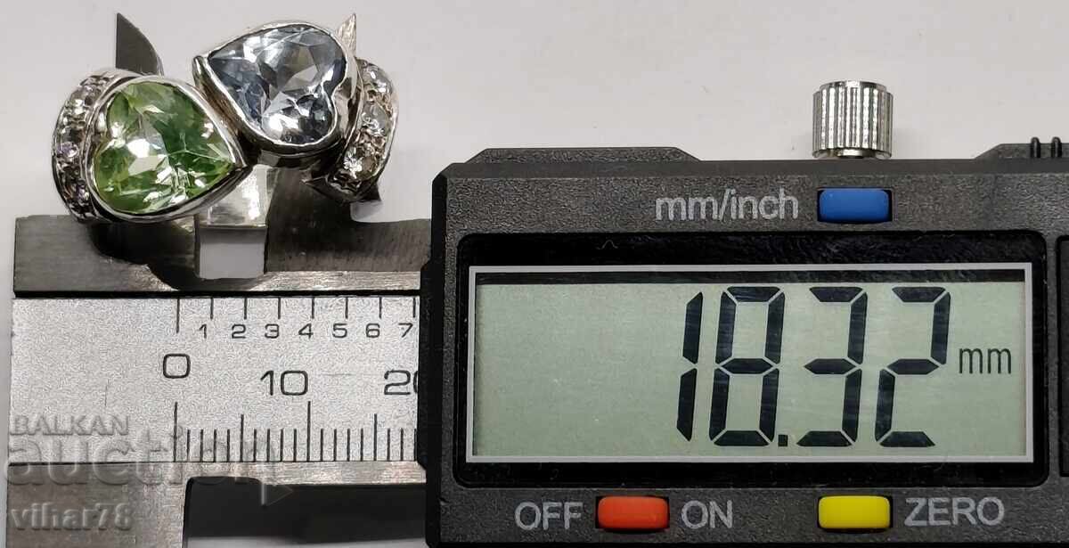 Women's silver ring with aquamarine and peridot with price 219.99 BGN | € 112.48