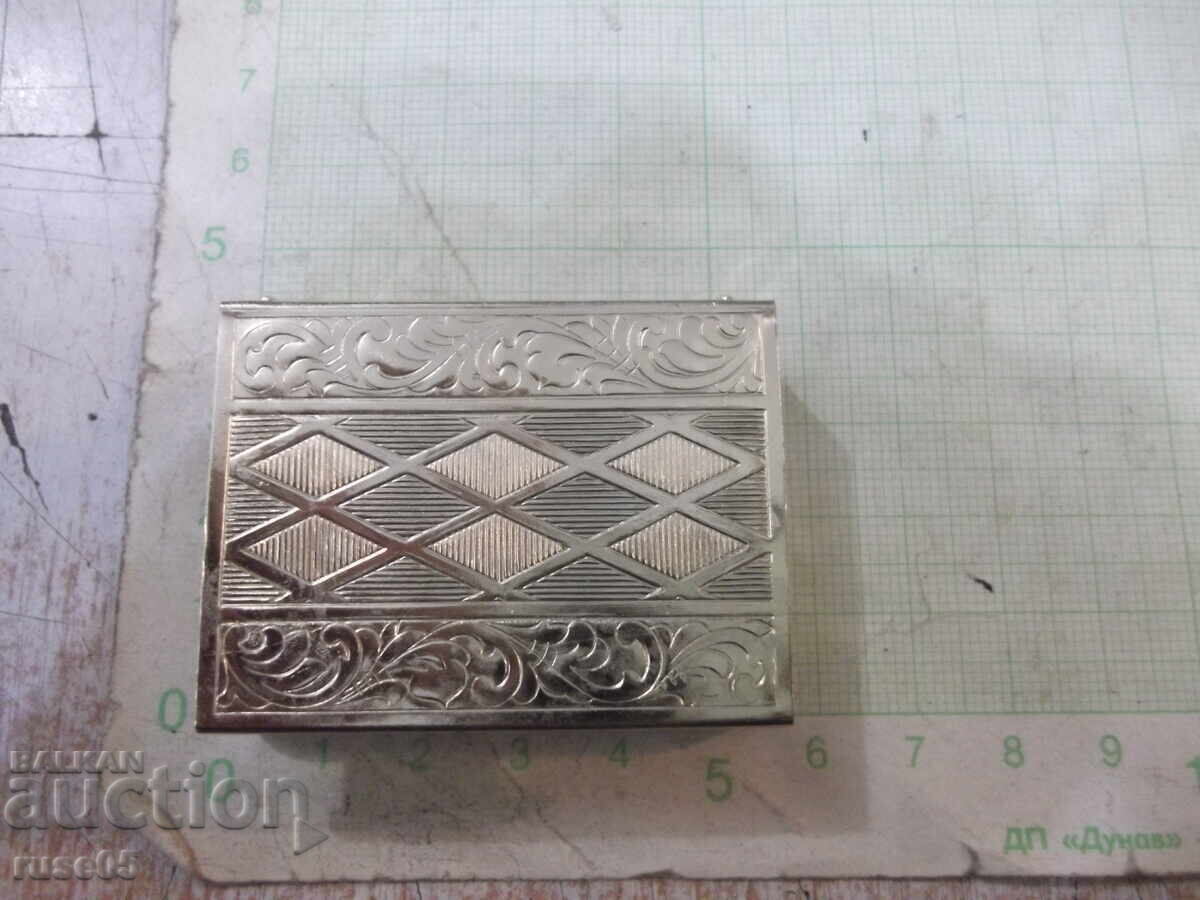 Auction Metal matchbox case Auction Metal matchbox case