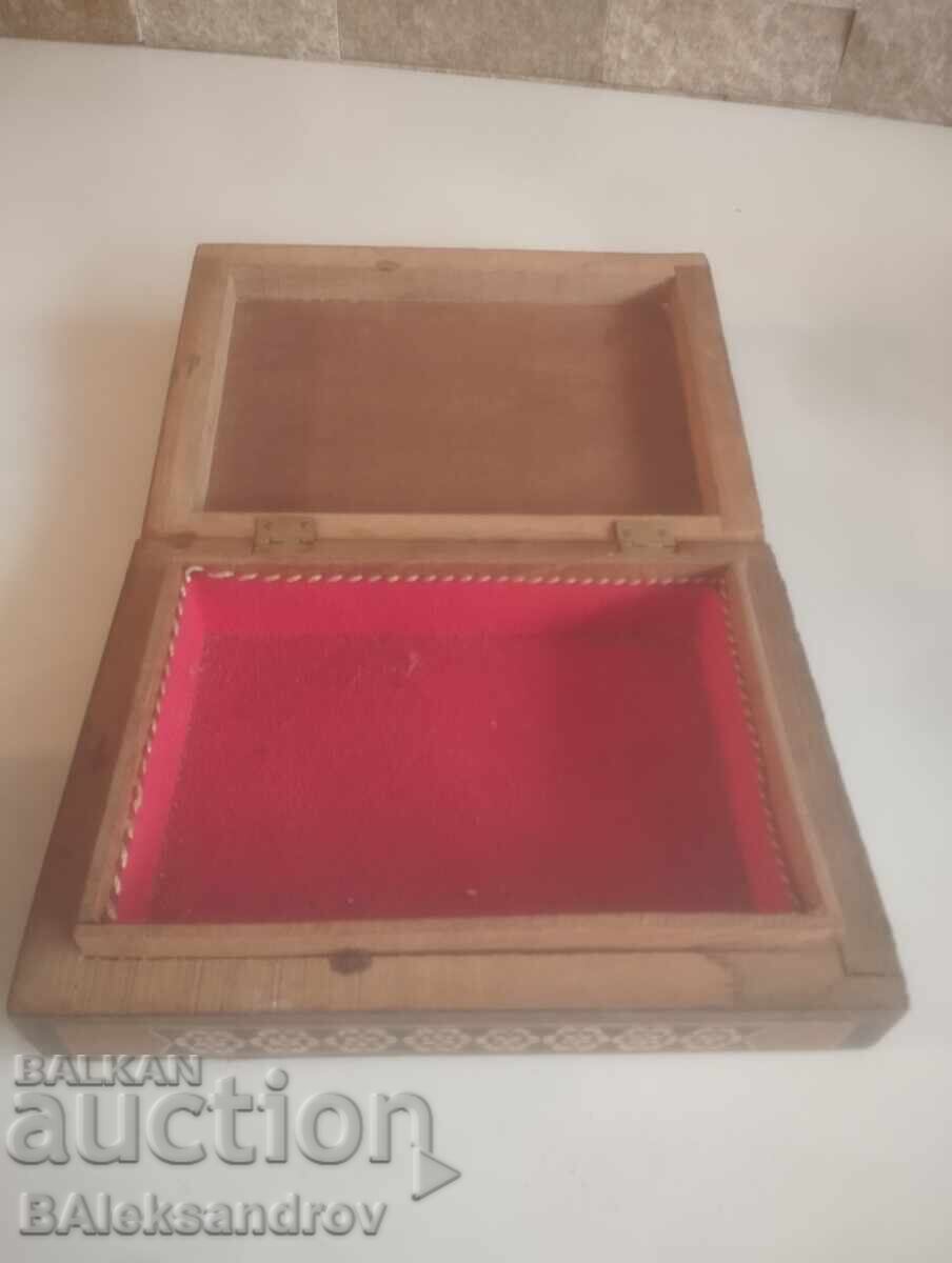 Delivery of Old wooden box richly inlaid