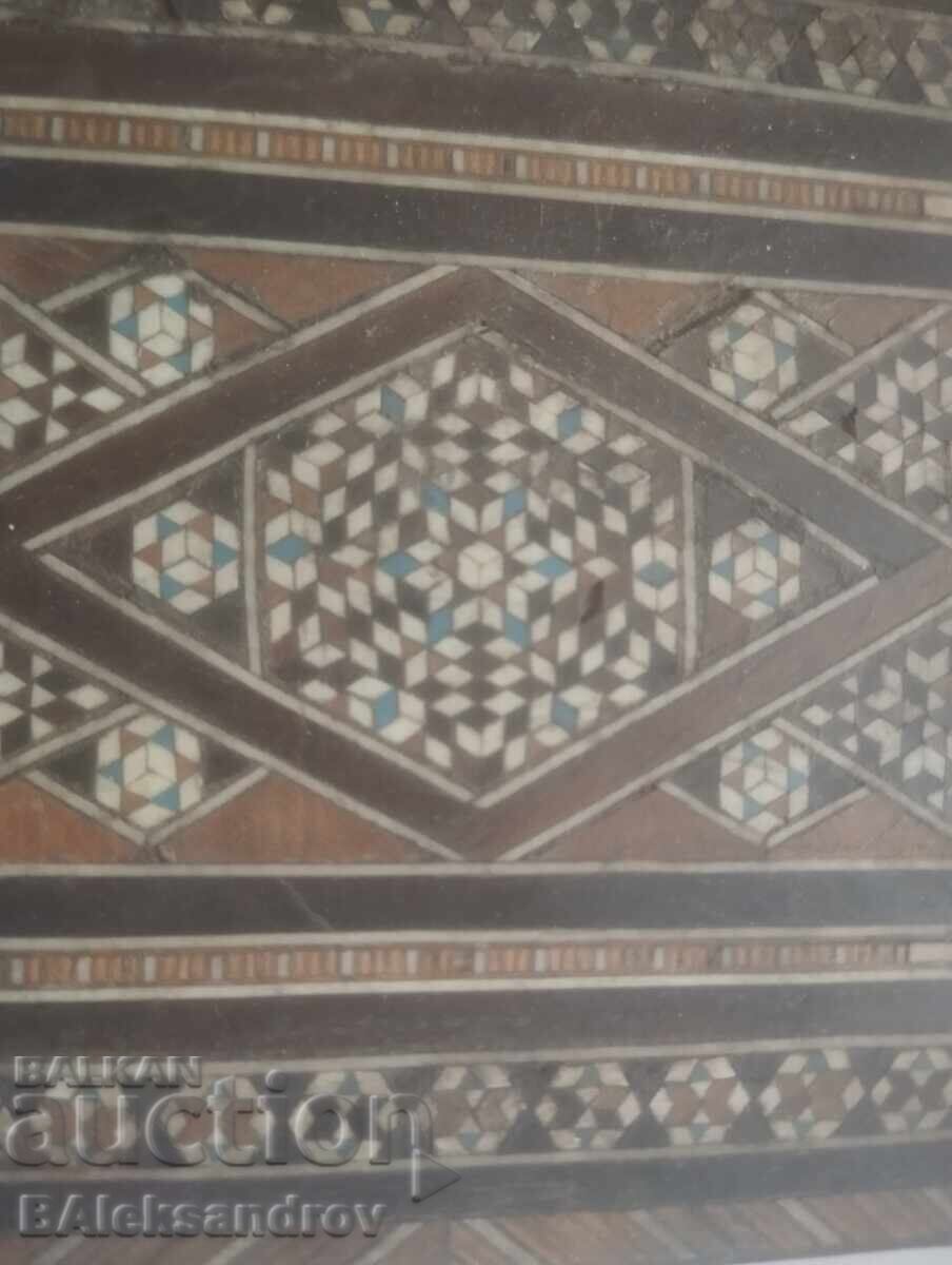 Old wooden box richly inlaid