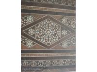 Old wooden box richly inlaid