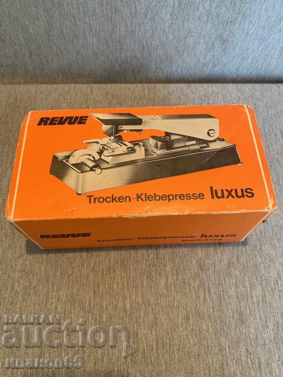 Revue dry glue press for 8mm tape gluing Revue dry glue press for 8mm tape gluing