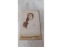 Photo Young girl with long hair with a ribbon Cardboard