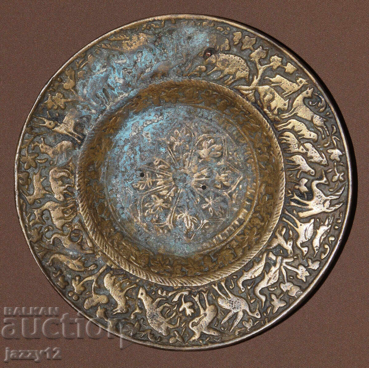 Old small bronze decorative plate