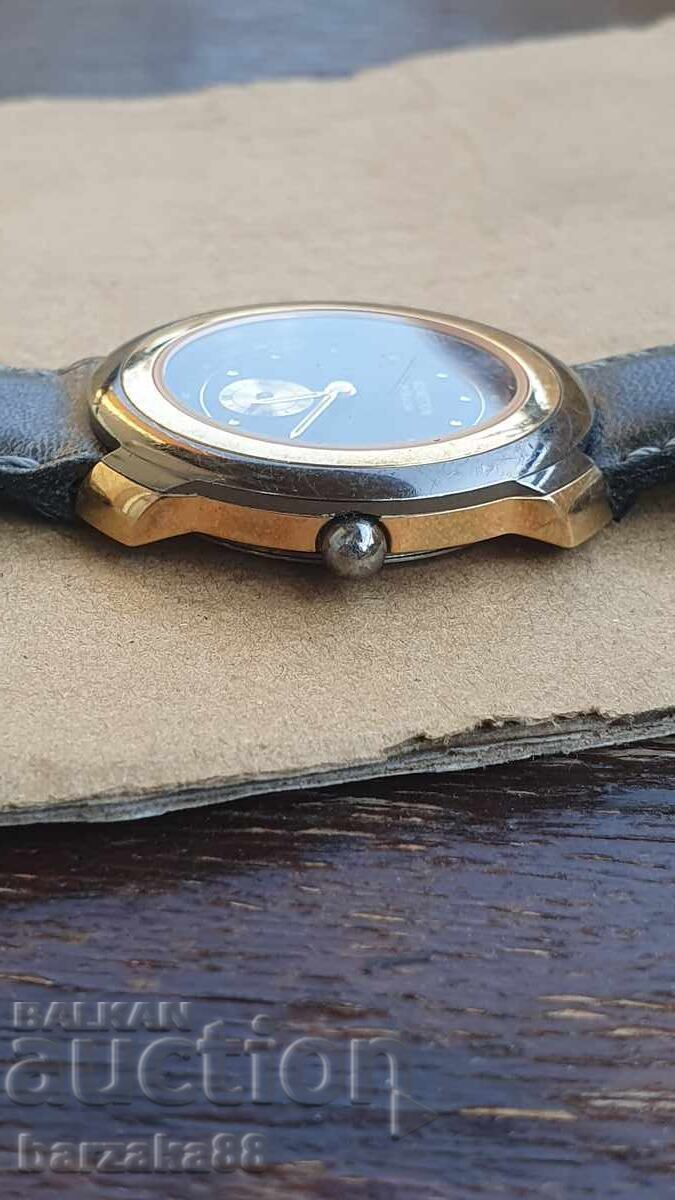 Livrarea Ceas de mână bărbătesc cu cuarț Benetton by Bulova Livrarea Ceas de mână bărbătesc cu cuarț Benetton by Bulova