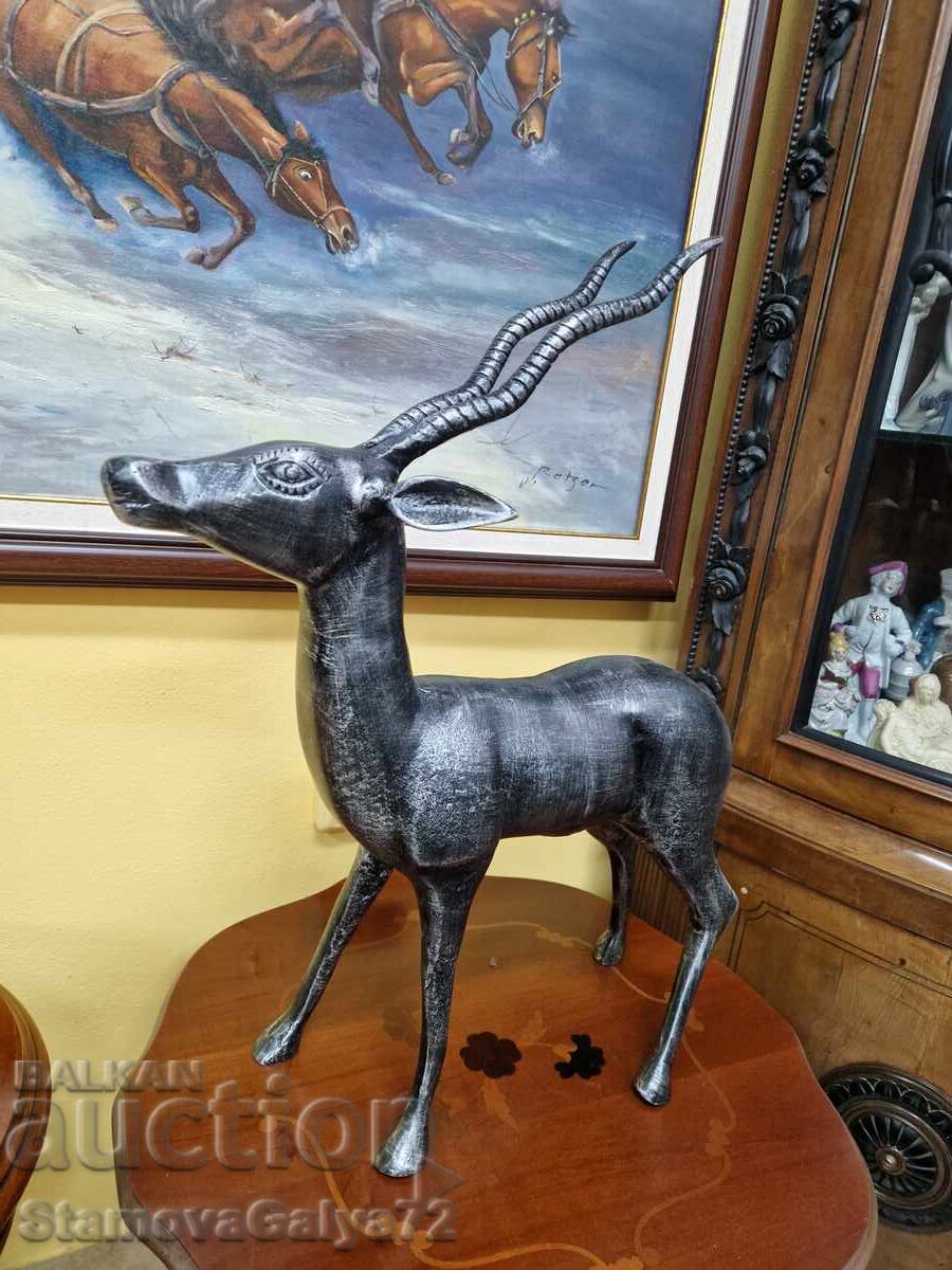 Delivery of Beautiful, huge metal figure statuette