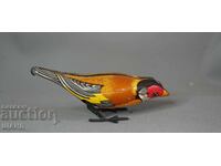 Old mechanical metal toy bird figure sparrow