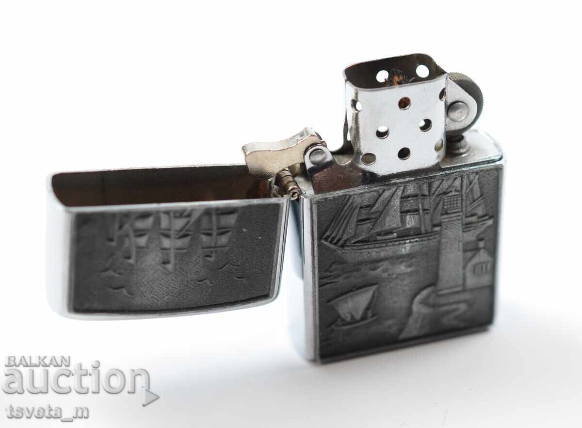 Аукцион Бензинова запалка Аукцион Бензинова запалка