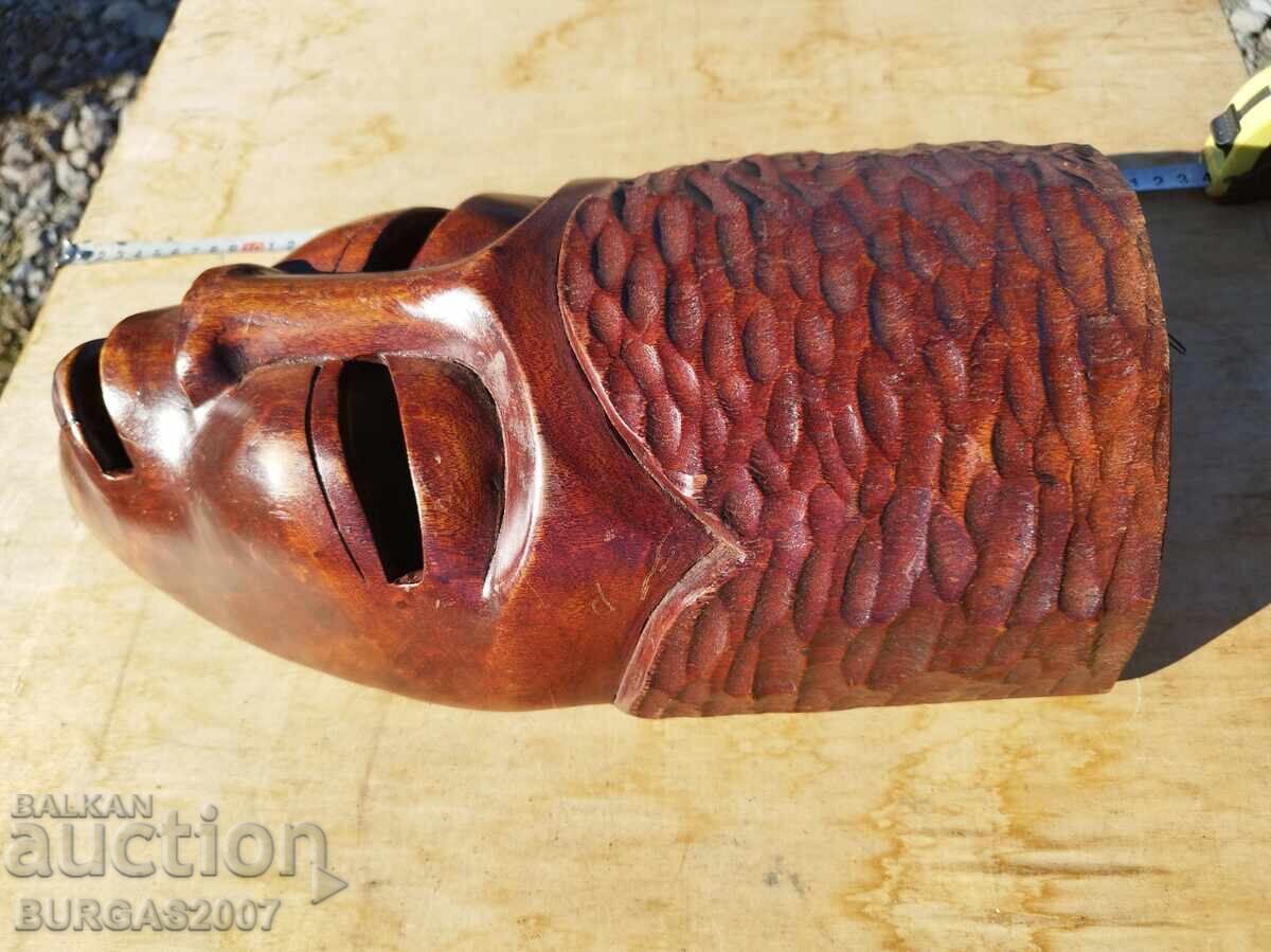 Auction Old wooden mask Auction Old wooden mask
