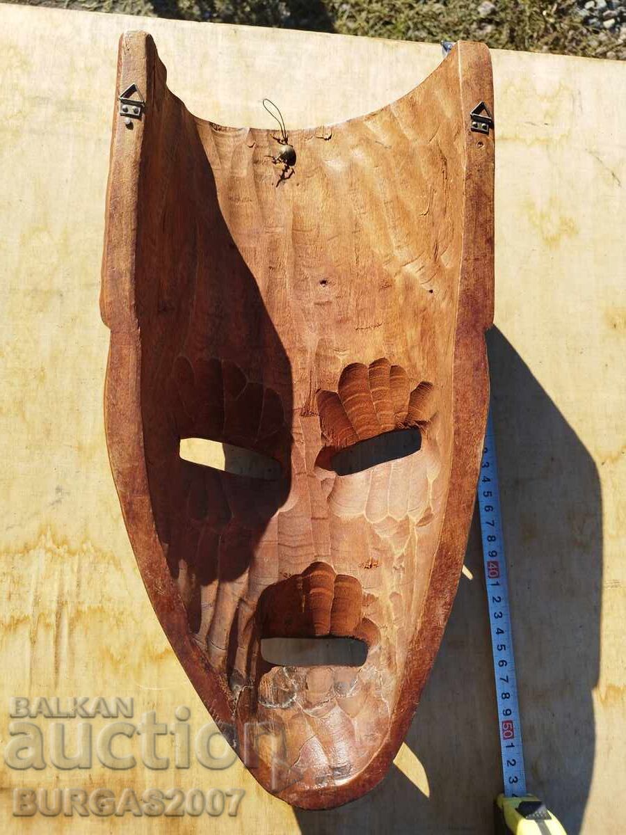 Delivery of Old wooden mask Delivery of Old wooden mask