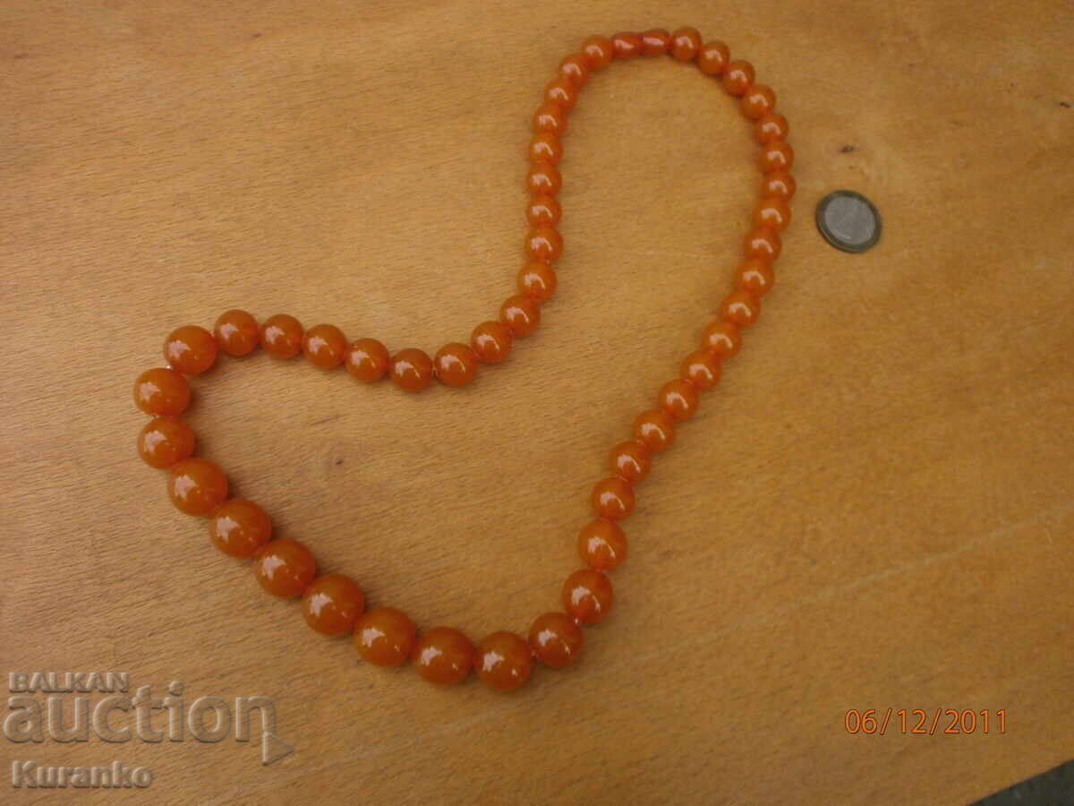Old amber necklace, 70 grams with price 150.00 BGN | € 76.69