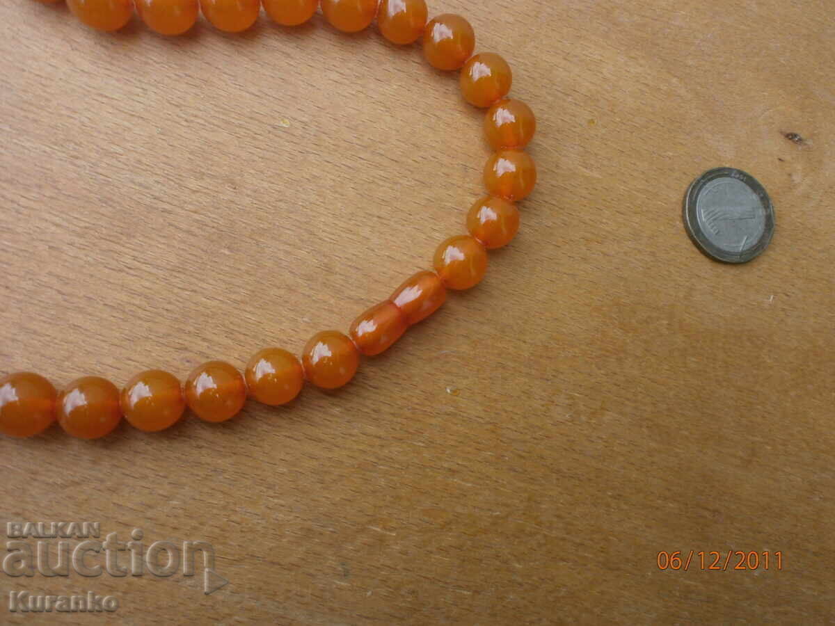 Delivery of Old amber necklace, 70 grams