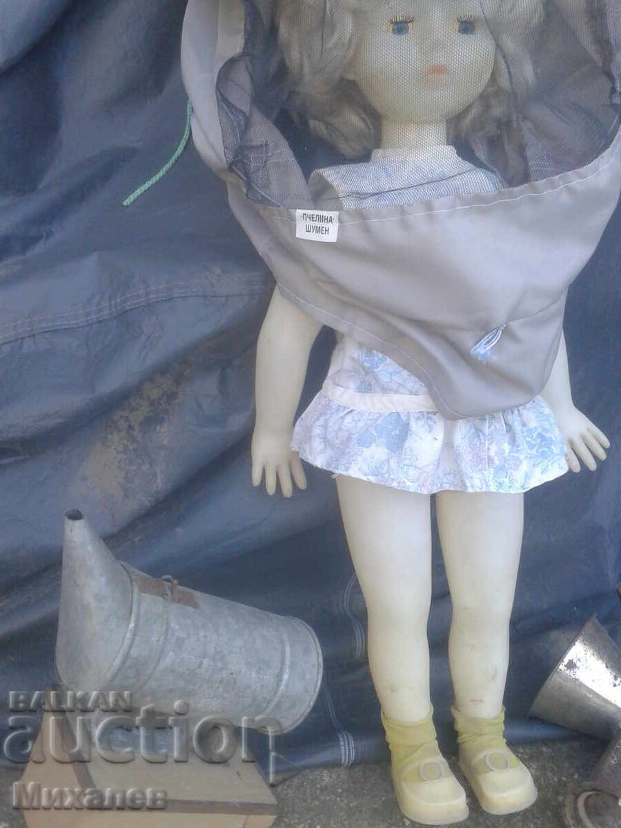 The little beekeeper with beekeeping equipment - 5