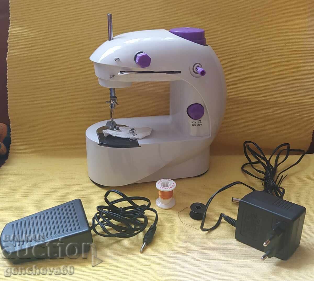 Mini sewing machine with pedal and two speeds
