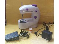 Mini sewing machine with pedal and two speeds