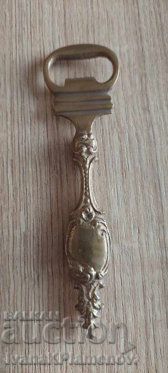 Deschizător de sticle din bronz pentru cunoscători