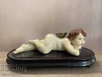 Vintage Spanish candlestick "Cupid" on a wooden base
