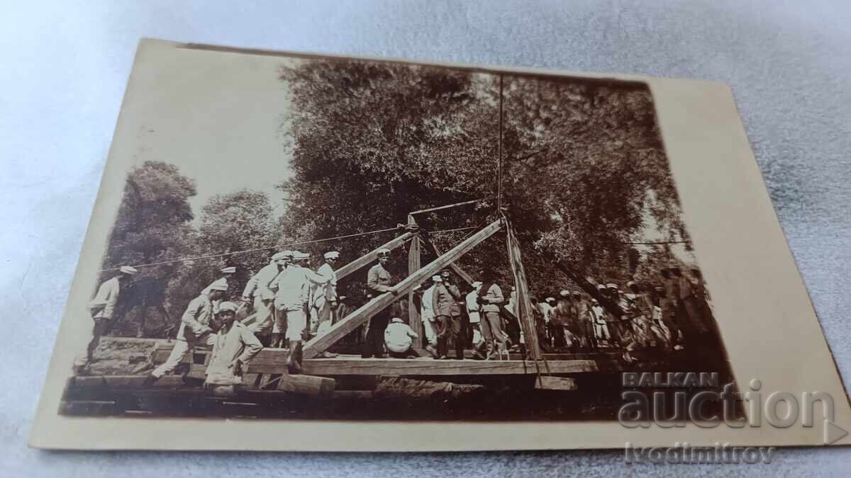 C-ka Tulcea Officers and soldiers on a wooden ramp on the river P W W